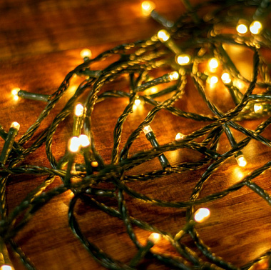 Гирлянда Феникс-Презент 220 LED ламп теплый белый свет 8 режимов питание от сети 20 м 94788